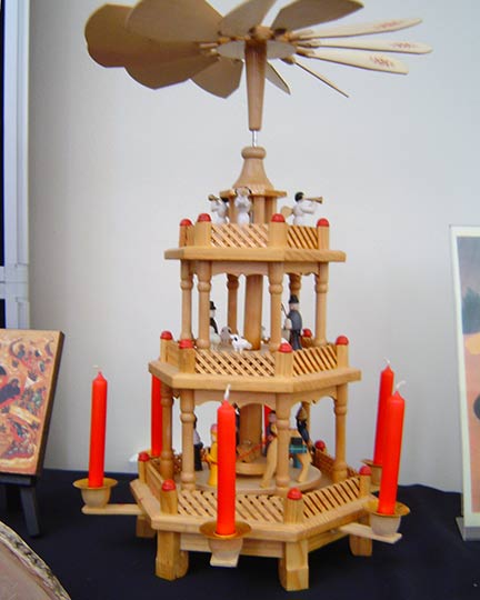 Three tier wooden model with moving parts