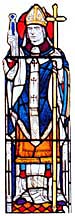 Photograph of a stained glass window depicting St Dunstan