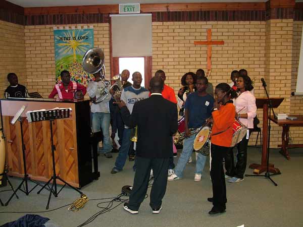 The band playing in the worship area